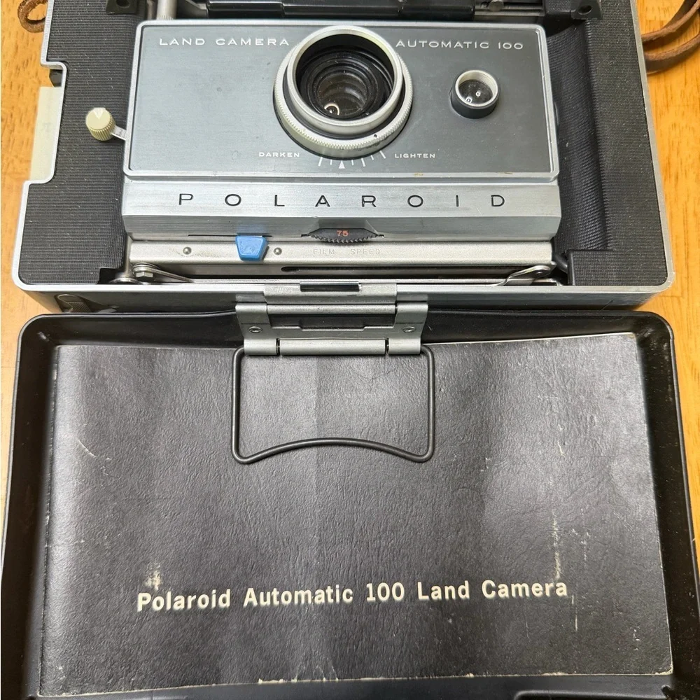 Vintage Polaroid Automatic 100 Land Camera in good overall condition, offered as